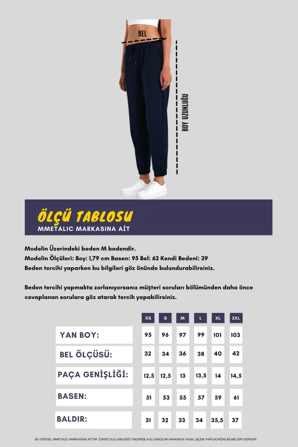 Pantalon de jogging confortable en coton épais noir pour femme, avec ourlet élastiqué et poches.