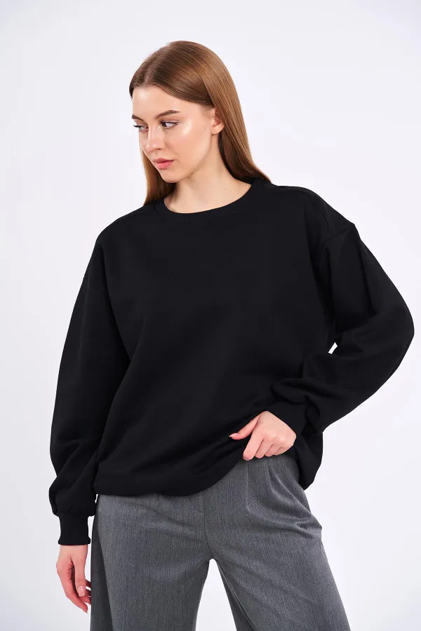 Sweat-shirt basique oversize en coton noir pour femme, col rond.