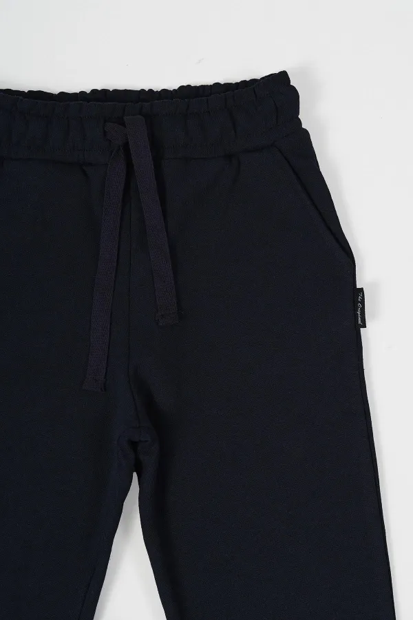 Pantalon de survêtement en coton épais bleu marine pour garçons, âgés de 5 à 12 ans, avec taille élastique et poches latérales.