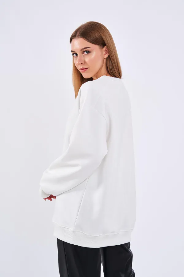 Sweat-shirt basique oversize en coton blanc cassé pour femme, col rond.