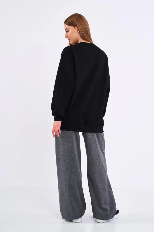 Sweat-shirt basique oversize en coton noir pour femme, col rond.