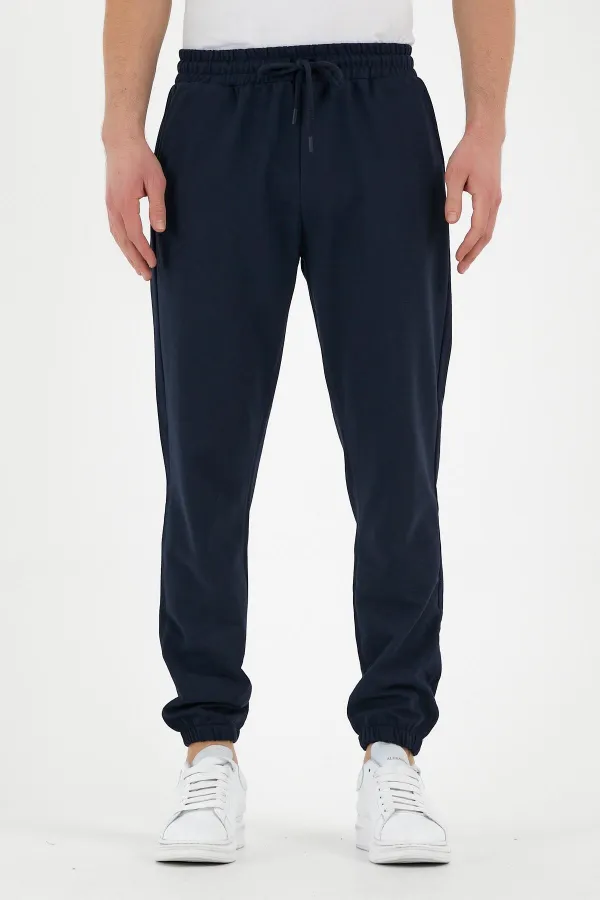 Pantalon de survêtement bleu marine pour homme, avec étiquette, poches arrière et latérales, coupe classique, taille élastiquée