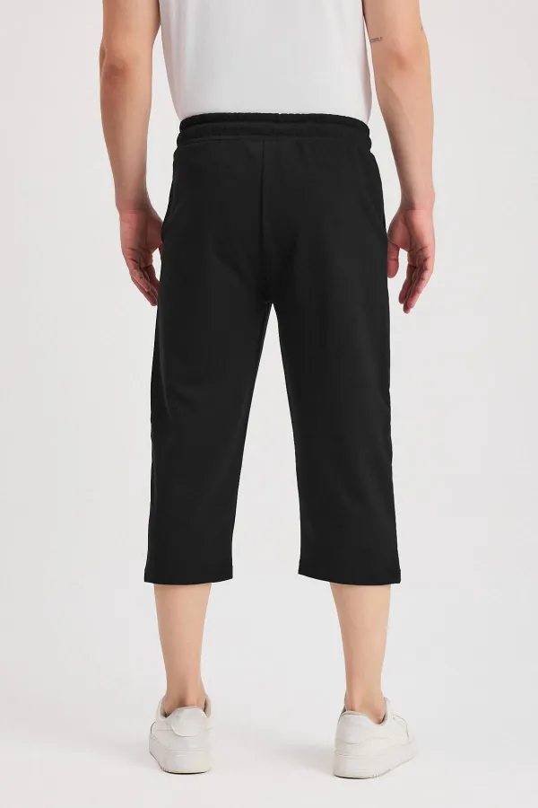 Short bermuda noir pour homme, longueur genou, style capri, avec poches latérales et taille élastique ajustable MTLCE108