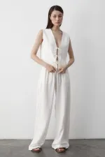 Ensemble gilet en mousseline blanche à 3 lacets