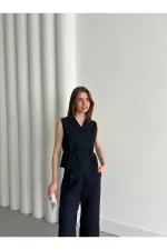 Ensemble gilet et pantalon bleu marine croisé