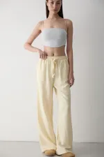 Pantalon jaune à jambes larges et taille élastiquée