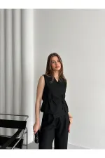 Ensemble gilet et pantalon noirs croisés