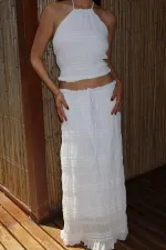 Ensemble chemisier et jupe en mousseline blanche à paillettes