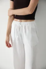 Pantalon blanc en coton et lin avec taille élastiquée