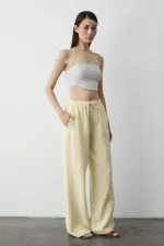 Pantalon jaune en coton et lin avec taille élastiquée
