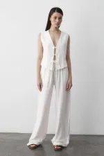 Ensemble gilet en mousseline blanche à 3 lacets