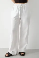 Pantalon blanc en coton et lin avec taille élastiquée