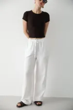 Pantalon blanc en coton et lin avec taille élastiquée