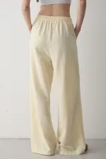 Pantalon jaune à jambes larges et taille élastiquée