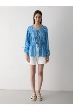 Chemise bleue en mousseline 100% coton avec manches élastiquées