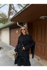 Veste noire à boutons dorés et châle - 9721