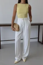 White Palazzo Pants with Gold Buttons and Elastic Waist White Palazzo Pants with Gold Buttons and Elastic Waist