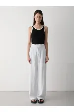 Pantalon blanc à jambes larges avec fermeture velcro