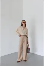 Pantalon beige en maille avec ceinture - 51150