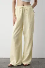 Pantalon jaune en coton et lin avec taille élastiquée