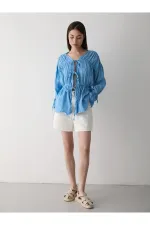 Chemise bleue en mousseline 100% coton avec manches élastiquées