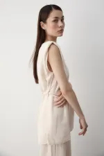 Ensemble deux pièces avec détails d'accessoires en pierre