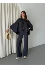 Ensemble anthracite à manches chauve-souris avec détail de bouton lacé