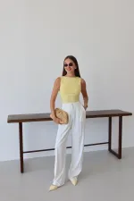 White Palazzo Pants with Gold Buttons and Elastic Waist White Palazzo Pants with Gold Buttons and Elastic Waist