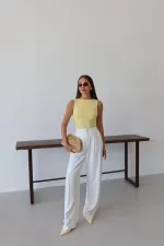 White Palazzo Pants with Gold Buttons and Elastic Waist White Palazzo Pants with Gold Buttons and Elastic Waist