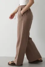 Pantalon en coton et lin couleur vison avec taille élastiquée