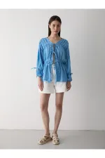 Chemise bleue en mousseline 100% coton avec manches élastiquées