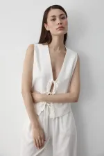 Ensemble gilet en mousseline blanche à 3 lacets
