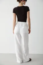Pantalon blanc en coton et lin avec taille élastiquée
