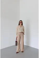 Pantalon beige en maille avec ceinture - 51150