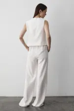 Ensemble gilet en mousseline blanche à 3 lacets