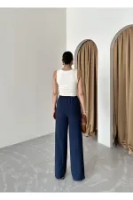 Pantalon bleu marine en coton et lin avec taille élastiquée