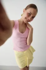 Chemisier rose côtelé à col V