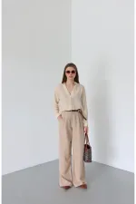 Pantalon beige en maille avec ceinture - 51150