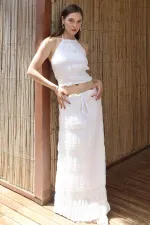 Ensemble chemisier et jupe en mousseline blanche à paillettes