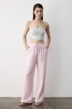 Pantalon rose à jambes larges et taille élastiquée