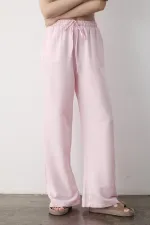 Pantalon rose à jambes larges et taille élastiquée