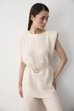 Ensemble deux pièces avec détails d'accessoires en pierre