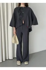 Ensemble anthracite à manches chauve-souris avec détail de bouton lacé