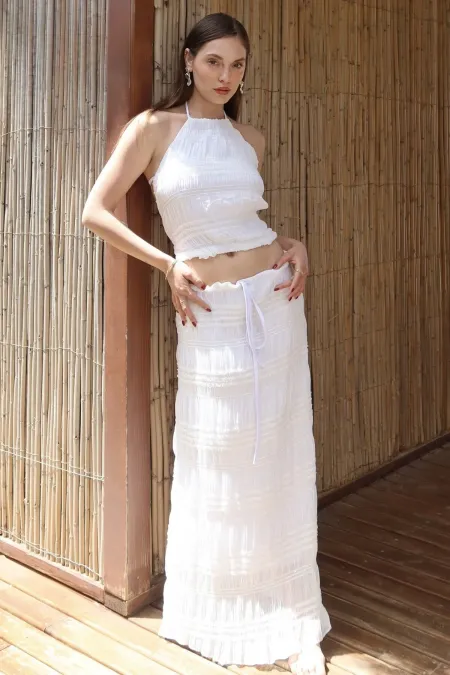 Ensemble chemisier et jupe en mousseline blanche à paillettes