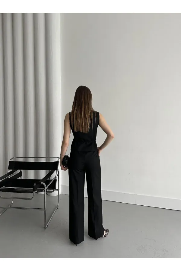 Ensemble gilet et pantalon noirs croisés