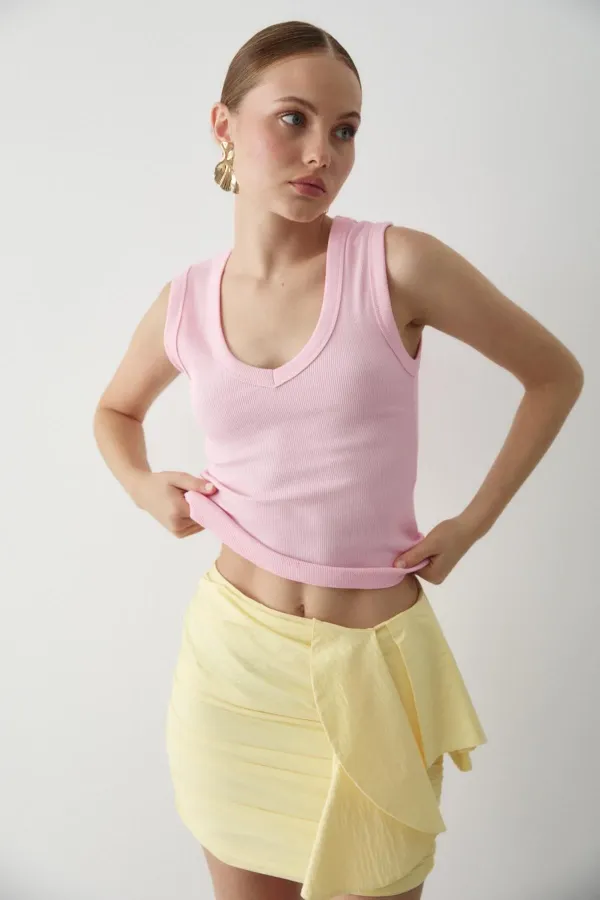 Chemisier rose côtelé à col V