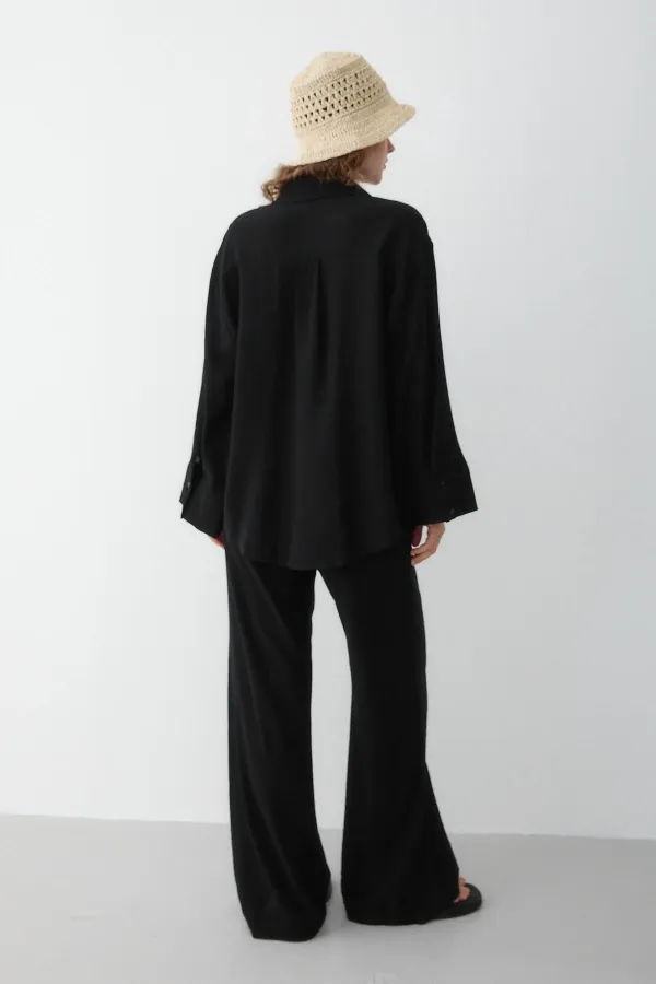 Ensemble chemise et pantalon noir texturé