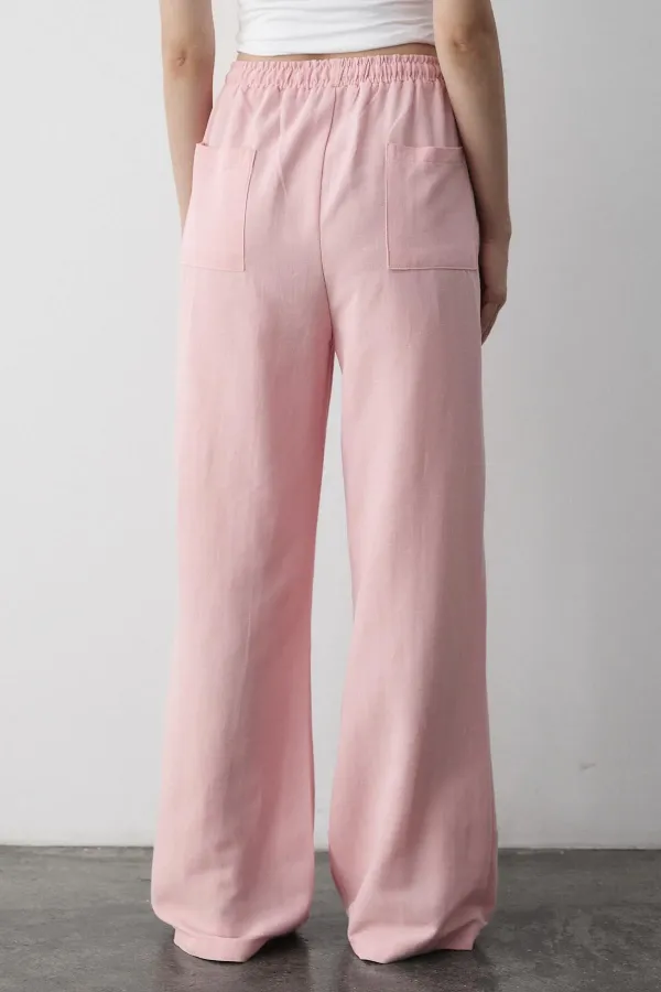 Pantalon rose en coton et lin avec taille élastique