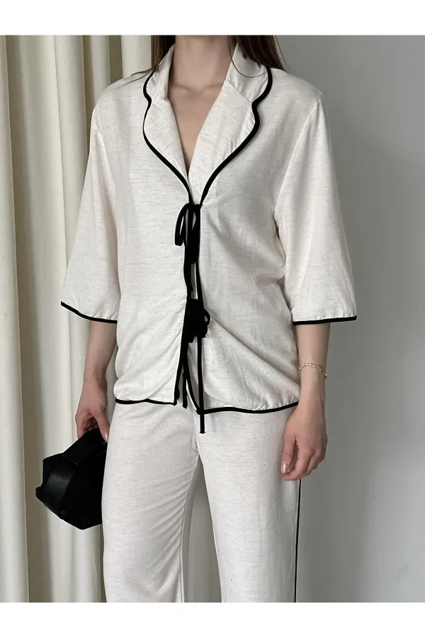 Ensemble chemisier et pantalon naturel à bordures noires