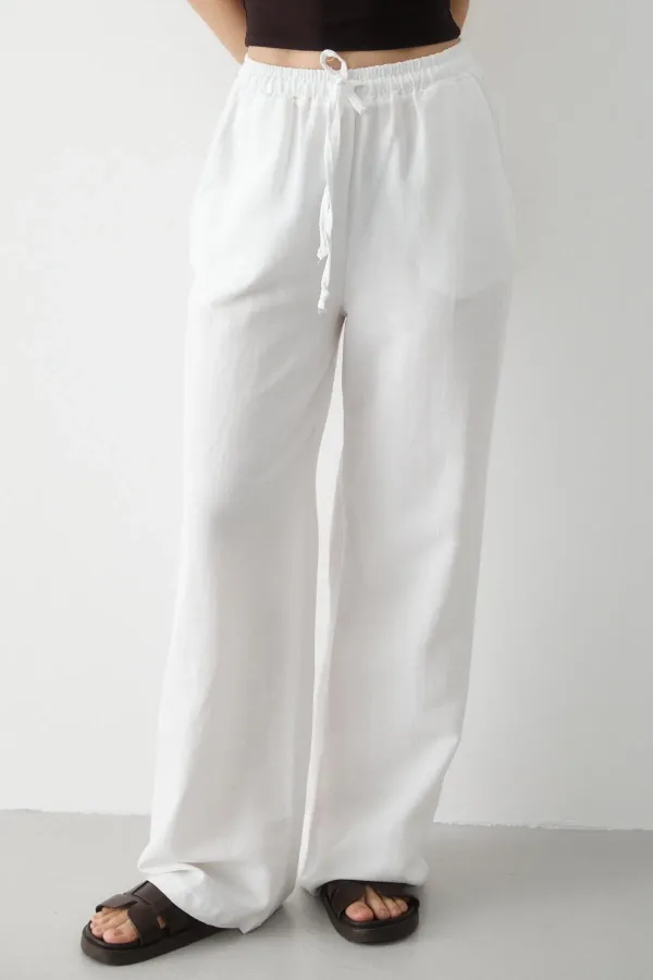 Pantalon blanc en coton et lin avec taille élastiquée